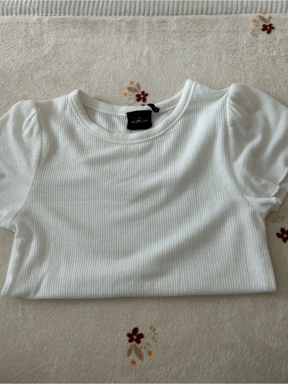Out from under tee